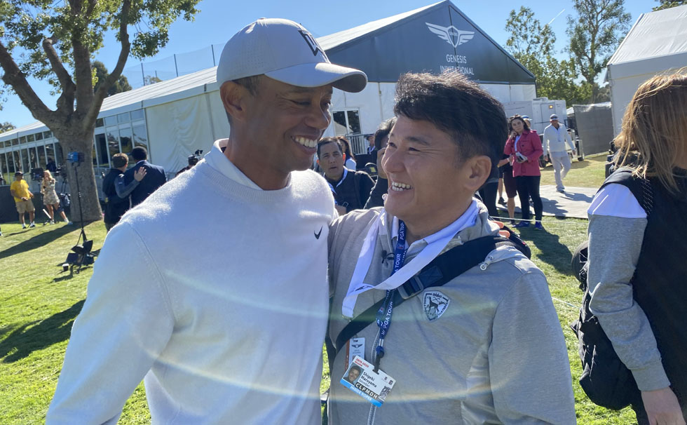 写真:タイガーウッズと丸山茂樹選手